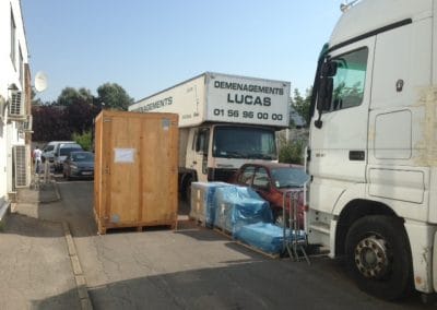 Transfert au dépôt d'un caisson entre 2 camions